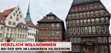 Blick auf die Hildesheimer Altstadt mit dem Text "Herzlich willkommen bei der SPD im Landkreis Hildesheim!"